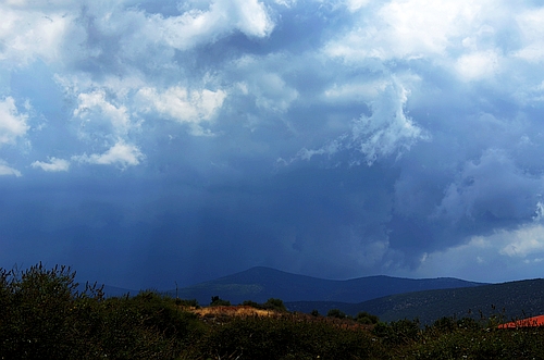 rain clouds over Iria