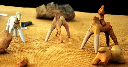 figurines of horses and horsemen