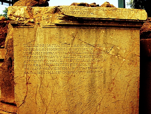 inscribed statue base